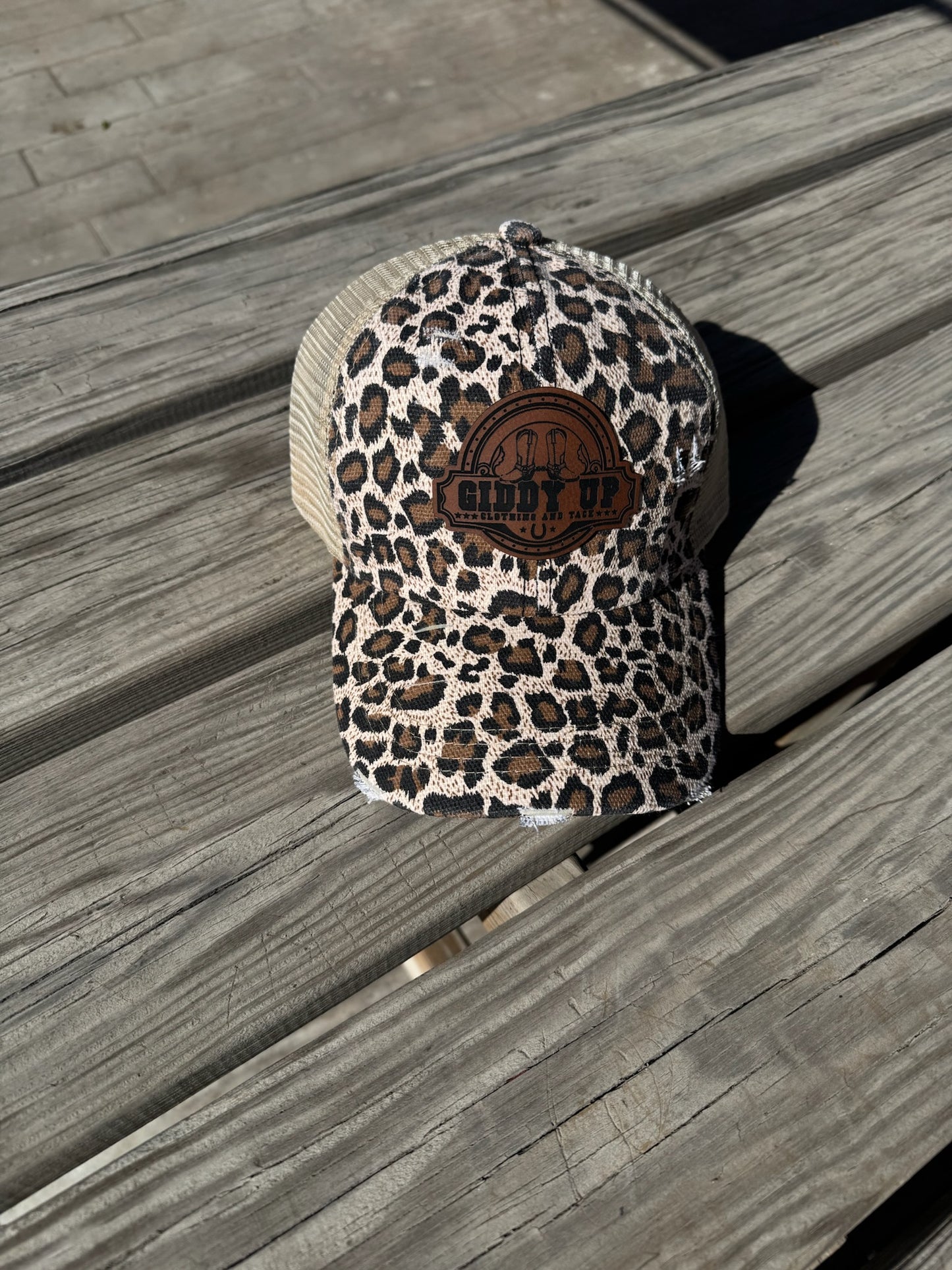 Women’s Criss-Cross Ponytail Hat with Leather Patch