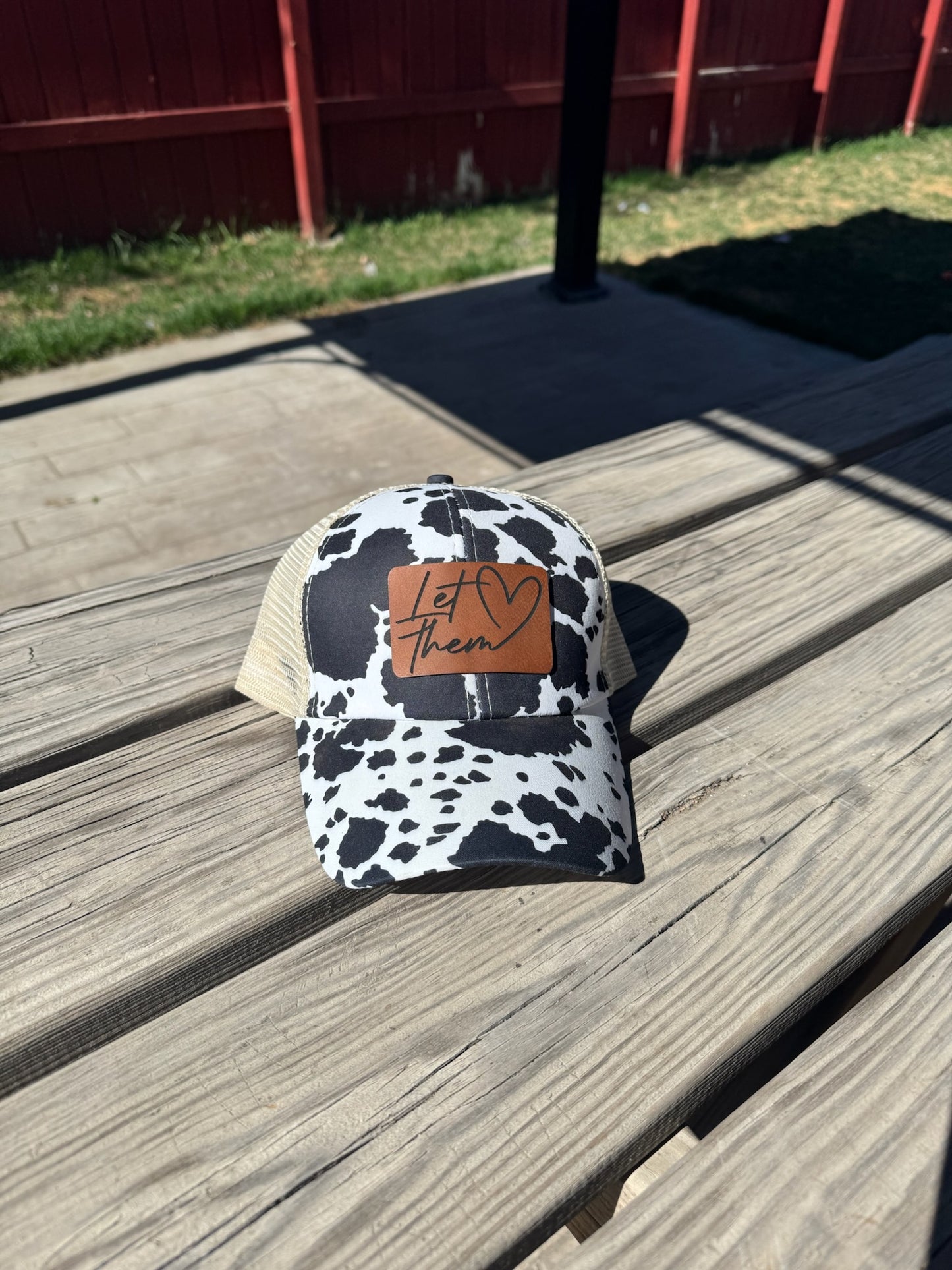 Women’s Criss-Cross Ponytail Hat with Leather Patch