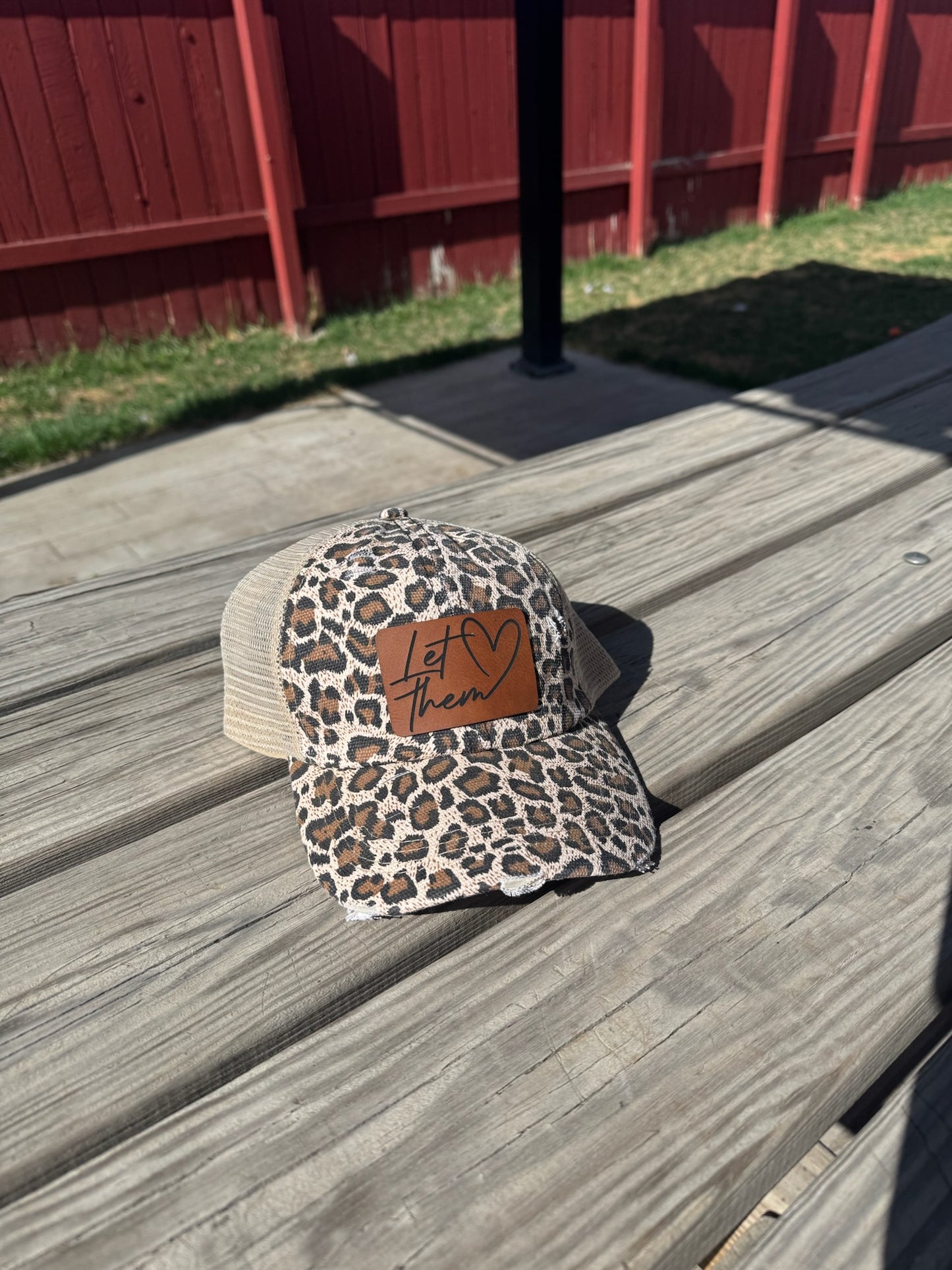 Women’s Criss-Cross Ponytail Hat with Leather Patch