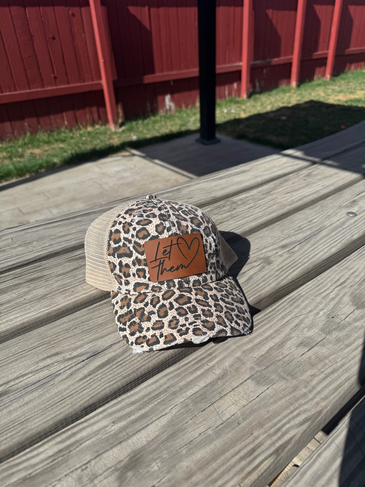 Women’s Criss-Cross Ponytail Hat with Leather Patch